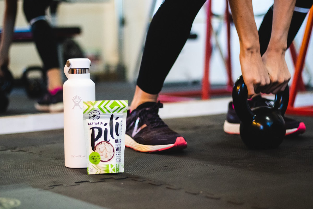 pili hunters nuts in the gym with kettlebell workout